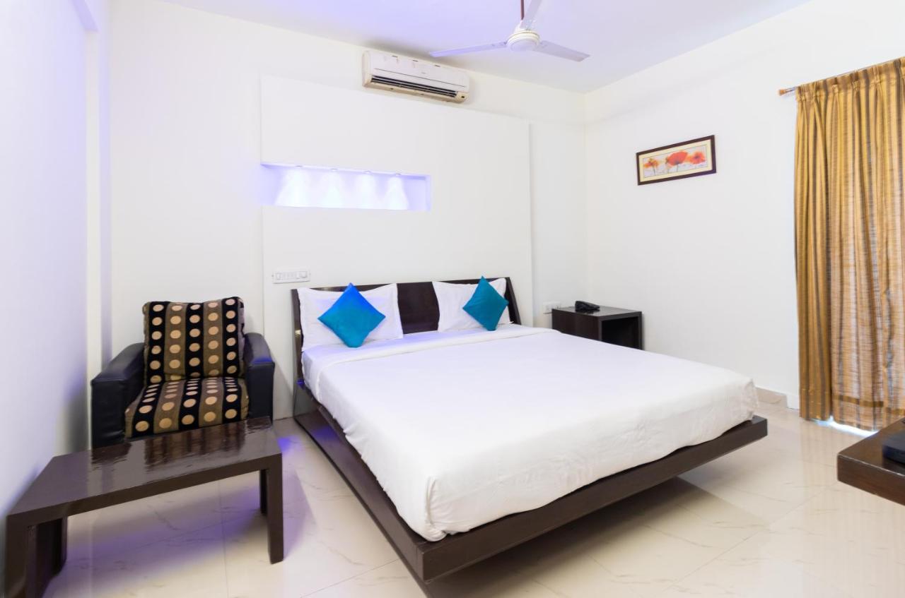 Sanctum Suites Domlur Bangalore Bilik gambar
